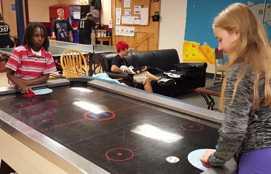 Jez & Lizzie battle it out on the Air Hockey table