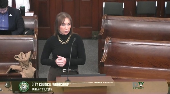 Woman speaking at podium at City Council workshop