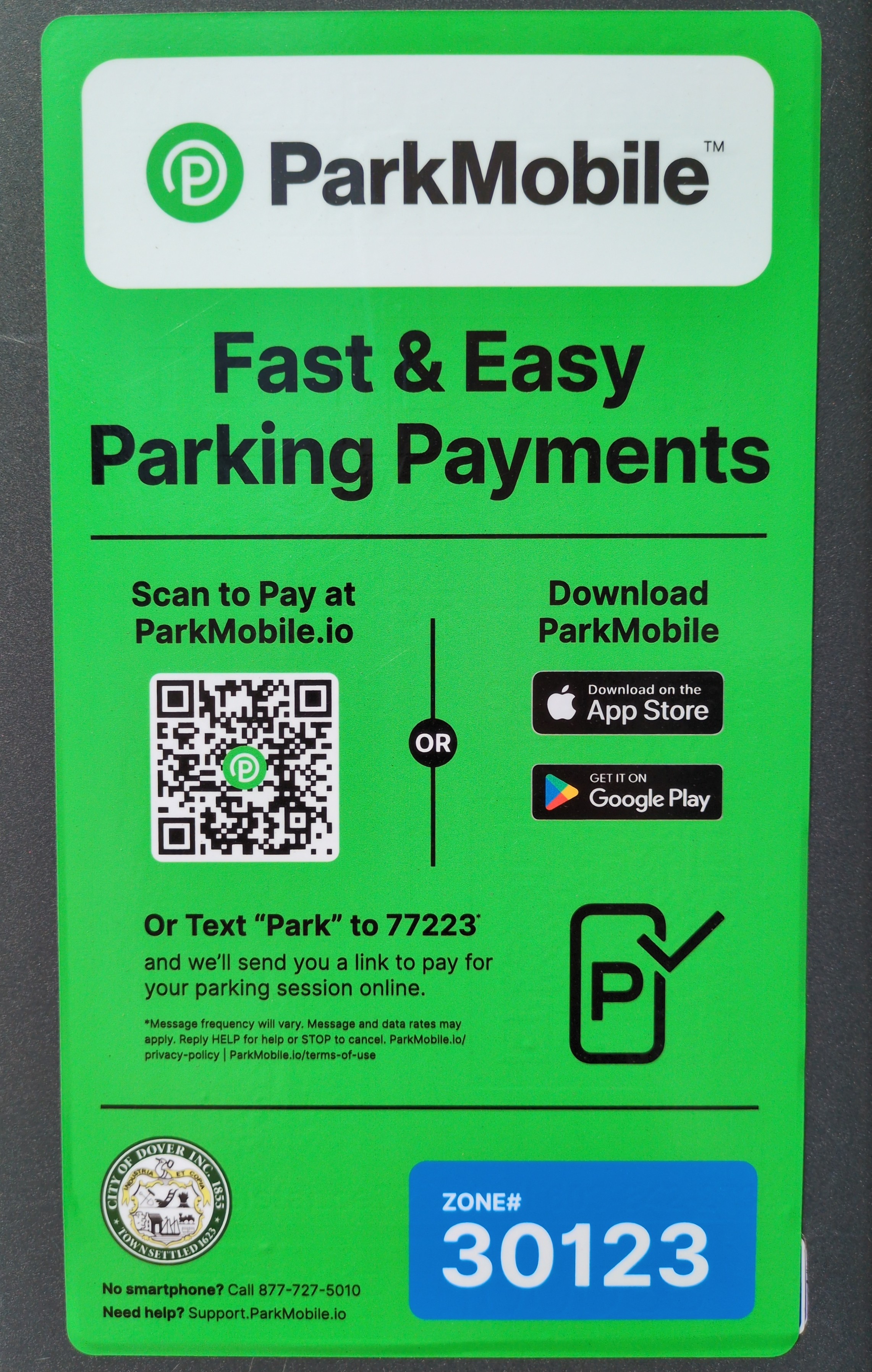 Shows the ParkMobile sticker located on each parking kiosk